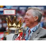 Sir Alex Ferguson ex Manchester United manager, signed card mounted within a photograph