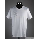 Rafael Nadal white Nike tennis shirt