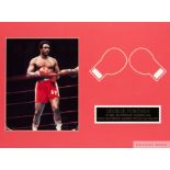 George Foreman signed photograph display,