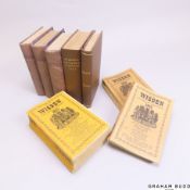 Eight volumes of The Wisden cricket almanack