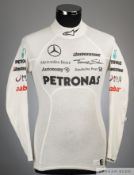 Nico Rosberg used Mercedes Nomex top by Alpinstars, 2010-11