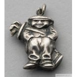 Silver golf pendant /charm in the form of a golfer carrying a golf bag,