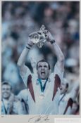 Martin Johnson signed colour image celebrating winning the 2003 Rugby World Cup,