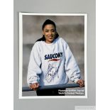 Signed colour photograph of Florence Griffiths Joyner, better known as 'Flo-Jo', signed 'love Flo-Jo