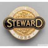 A gilt-metal and enamel 1934 F.A. Cup Steward's badge