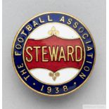 A gilt-metal and enamel 1938 F.A. Cup Steward's badge