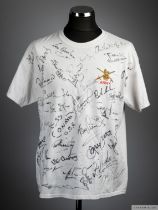 An Army white t-shirt bearing over thirty sportsmen and celebrity autographs
