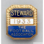 A gilt-metal and enamel 1933 F.A. Cup Steward's badge