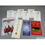 A file containing a selection of Manchester United menus and ephemera