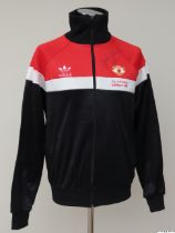 Gordon McQueen red, white and black Manchester United 1983 F.A.Cup Final tracksuit top