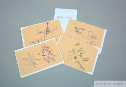 Four autograph book pages signed by Madness