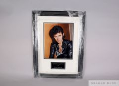 A hand signed colour photograph of Alvin Stardust