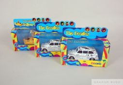 The Beatles Corgi Yellow Submarine and two Newspaper Taxis