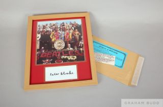 A framed and mounted montage photographic print of The Beatles Sgt Pepper album cover