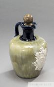 Edwardian Royal Doulton flask & stopper commemorating the jockey Fred Archer, green glazed body