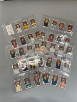 A good album of eleven complete sets of horse racing-themed cigarette cards issued between c.1906 an