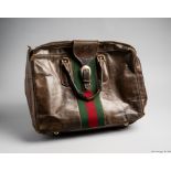 Lester Piggott's custom made leather travelling saddle bag by Gucci of Italy, brown leather,