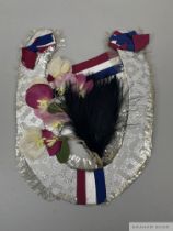 A 'Good Luck' horseshoe sent to Mrs Marion Glenister the owner of Nimbus before the 1949 Derby,
