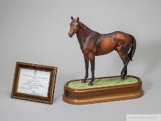 Royal Worcester porcelain model of the racehorse Mill Reef modelled by Doris Lindner, on wooden