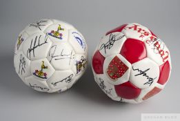 A leather red and white Arsenal signed football 1996-97