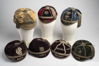 An interesting collection of seven late Victorian and later sporting caps