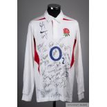 White and red England rugby shirt, bearing thirty-seven player autographs, 2004