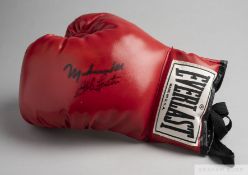 Red Everlast boxing glove autographed by Muhammad Ali