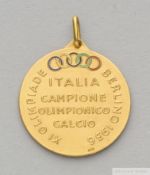 18k gold and enamel medal awarded to Ottorino Barassi commemorating the gold medal victory of