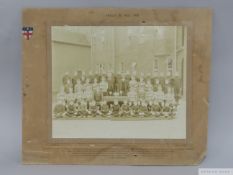 Fifteen various sepia-toned and black and white team line-up photographs from 1909