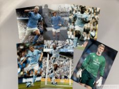 Manchester City a collection of nineteen autographed colour photographs