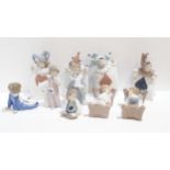 A set of four Nao figures of children dressed as playing cards, together with six other Nao