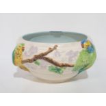 A Clarice Cliff moulded parrot bowl Condition Report:Available upon request