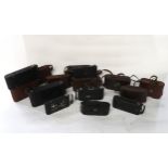 A large quantity of vintage folding cameras with examples by Kodak, Ensign, Goerz, Voigtlander