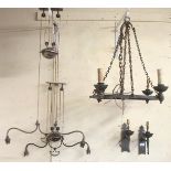 A ecclesiastical style cast iron four sconce chandelier, pair of rise and fall ceiling lights and