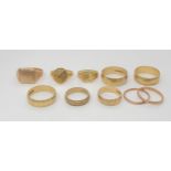 Ten 9ct gold rings to include wedding bands, and signet rings, weight together 29.4gms Condition