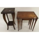 A 20th century mahogany nest of three tables with leather skiver tops, a carved two tier