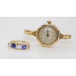 A 9ct gold cased ladies watch, together with a clear and blue gem set traditional scroll ring,