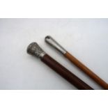 A substantial walking cane with chased white metal top, by repute owned by James Whyte of Whyte &