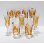 A set of six flashed and hob nail cut tumblers, with etched flower decoration, together with three