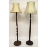 A lot of two early 20th century turned mahogany standard lamps, 175cm & 172cm high (2) Condition