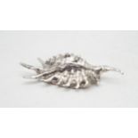 A novelty silver plated  paperweight modelled as a conch shell, by Christofle, France, with box
