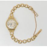 A 9ct gold ladies vintage watch and strap, weight including mechanism 17.5gms  Condition Report: