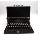 An Underwood Standard Portable Typewriter, in travel case Condition Report:Available upon request