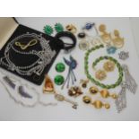 A Butler & Wilson rainbow bird brooch, a snake bangle, an enamel brooch and other items Condition