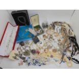 A collection of costume jewellery to include, items by Pilgrim, and a glass perfume bottle and other