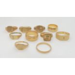 Three 9ct gold wedding rings together with seven 9ct gold and yellow metal signet rings, weight