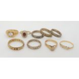 Nine 9ct gold rings, to include four 9ct and silver eternity rings, weight all together 23.3gms