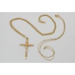 A 9ct gold crucifix and curb chain, length of chain 50cm, together with an elongated box chain