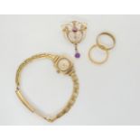 An 18ct gold wedding ring, weight 3.2gms. 9ct gold Edwardian pendant set with amethyst and pearl,