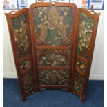 A Victorian mahogany framed screen surrounding overpainted embossed leather panels 166cm high
